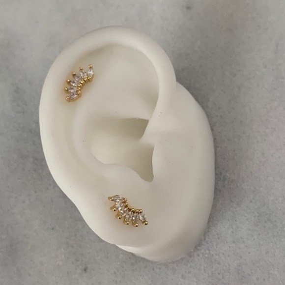 Modest Lu Jewelry - 18K Gold Crystal Arch Huggie Earrings Brand New

Brand New